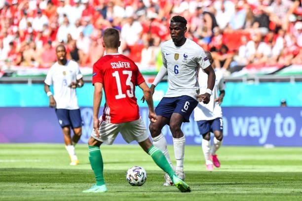 Paul POGBA of France against Andras SCHAFER of Hungary during the UEFA European Championship football match between Hungary and France at Ferenc...