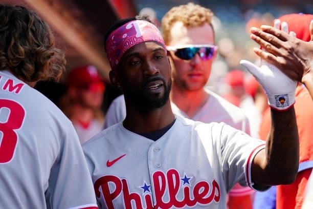 Andrew McCutchen of the Philadelphia Phillies celebrates in the dugout during the game between the Philadelphia Phillies and the San Francisco Giants...