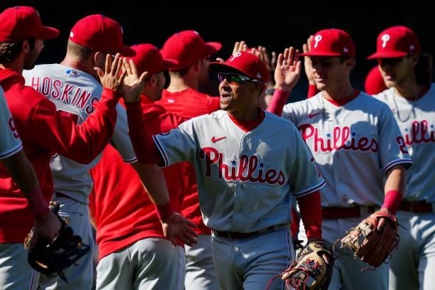 Members of the Philadelphia Phillies celebrate after defeating the San Francisco Giants at Oracle Park on Saturday, June 19, 2021 in San Francisco,...