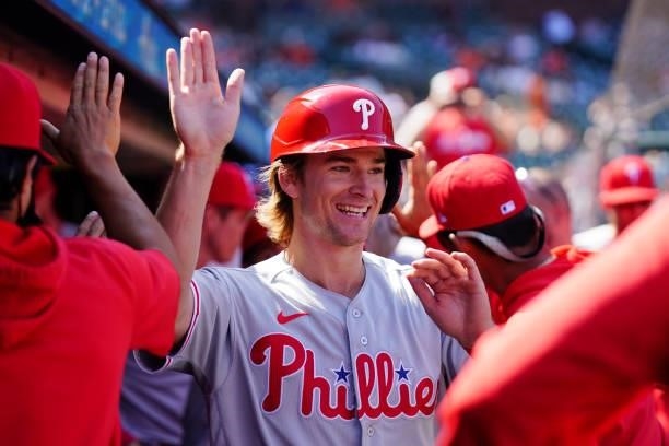 Luke Williams of the Philadelphia Phillies celebrates in the dugout during the game between the Philadelphia Phillies and the San Francisco Giants at...