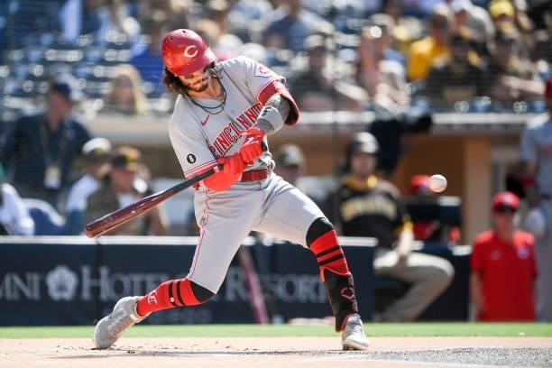Jonathan India of the Cincinnati Reds hits a single during the first inning of a baseball game against the San Diego Padres at Petco Park on June 19,...
