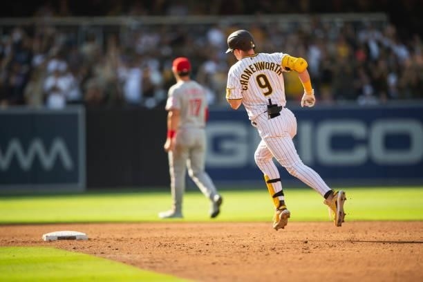 Jake Cronenworth of the San Diego Padres jogs around the bases after a home run in the third inning against the Cincinnati Reds on June 19, 2021 at...
