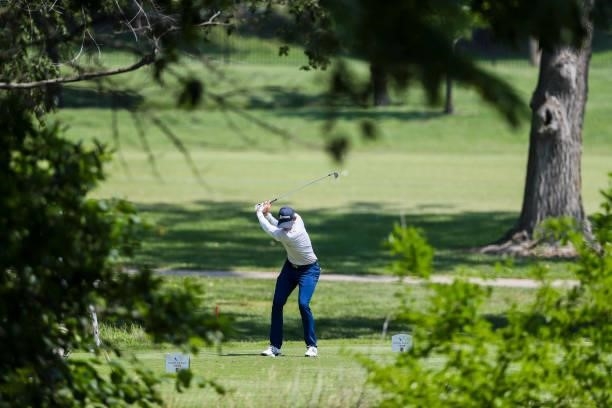 Jared Wolfe plays his shot from the 12th tee during the third round of the Wichita Open Benefitting KU Wichita Pediatrics at Crestview Country Club...