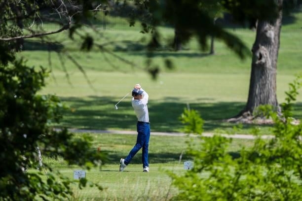 Jared Wolfe plays his shot from the 12th tee during the third round of the Wichita Open Benefitting KU Wichita Pediatrics at Crestview Country Club...
