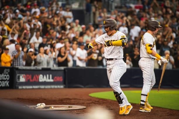 Ha-seong Kim of the San Diego Padres celebrates after hitting a home run in the eighth inning against the Cincinnati Reds on June 19, 2021 at Petco...