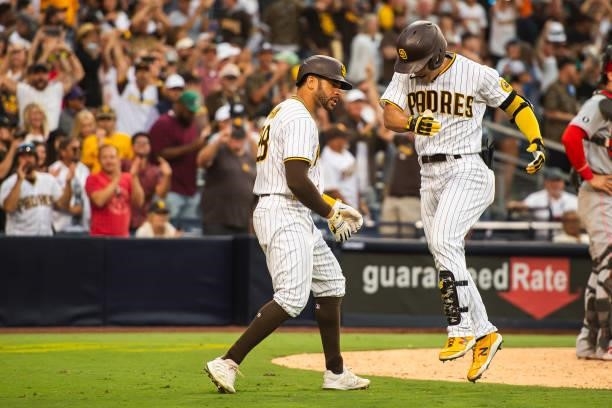 Ha-seong Kim of the San Diego Padres celebrates after hitting a home run in the eighth inning against the Cincinnati Reds on June 19, 2021 at Petco...