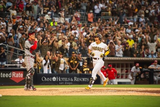 Ha-seong Kim of the San Diego Padres celebrates hitting a home run in the eighth inning against the Cincinnati Reds on June 19, 2021 at Petco Park in...
