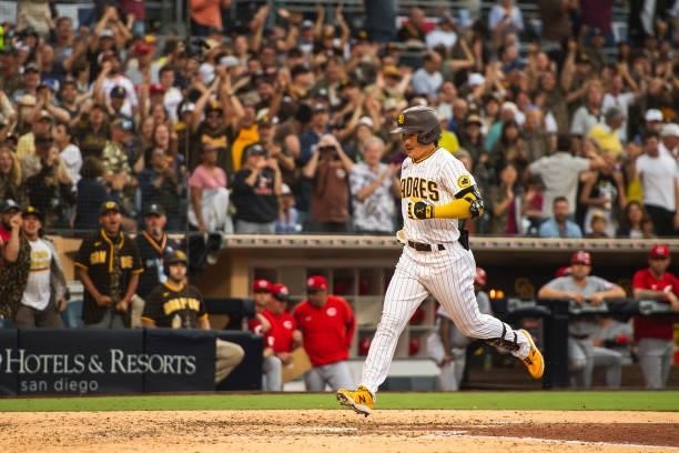 Ha-seong Kim of the San Diego Padres celebrates hitting a home run in the eighth inning against the Cincinnati Reds on June 19, 2021 at Petco Park in...