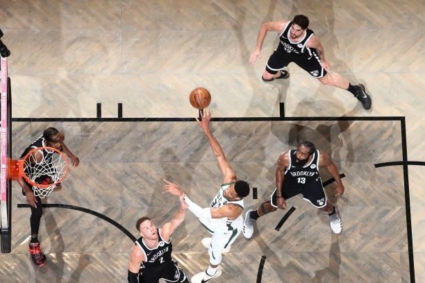 Giannis Antetokounmpo of the Milwaukee Bucks passes the ball during the game against the Brooklyn Nets during Round 2, Game 7 of the 2021 NBA...