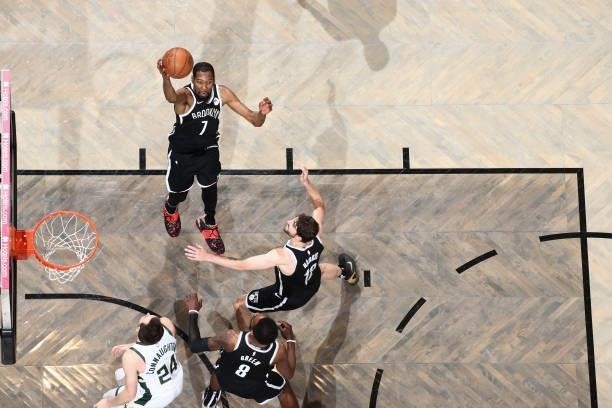 Kevin Durant of the Brooklyn Nets rebounds the ball during the game against the Milwaukee Bucks during Round 2, Game 7 of the 2021 NBA Playoffs on...