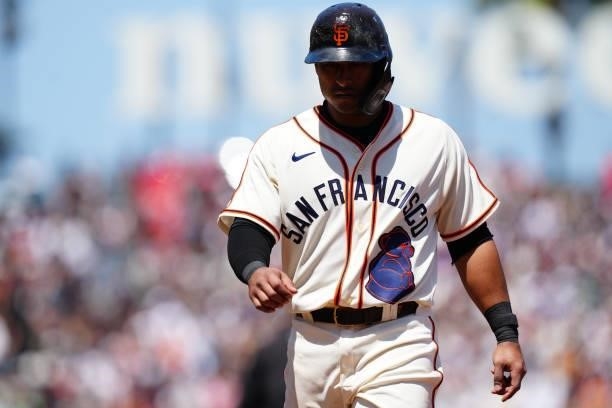 Donovan Solano of the San Francisco Giants walks back to first during the game between the Philadelphia Phillies and the San Francisco Giants at...