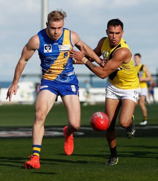Nick Mellington of the Seagulls and Sydney Stack of the Tigers in action during the VFL Round 10 match between the Williamstown Seagulls and the...