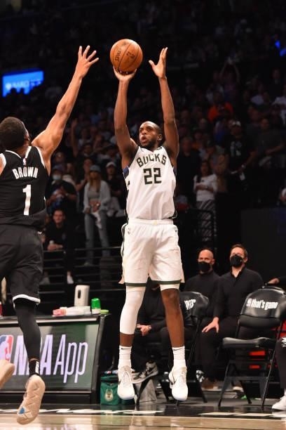 Khris Middleton of the Milwaukee Bucks shoots a three-pointer against the Brooklyn Nets during Round 2, Game 7 on June 19, 2021 at Barclays Center in...