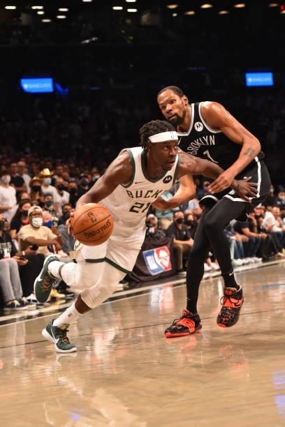 Jrue Holiday of the Milwaukee Bucks handles the ball against Kevin Durant of the Brooklyn Nets during Round 2, Game 7 on June 19, 2021 at Barclays...
