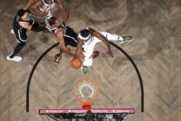 Jrue Holiday of the Milwaukee Bucks drives to the basket during the game against the Brooklyn Nets during Round 2, Game 7 of the 2021 NBA Playoffs on...