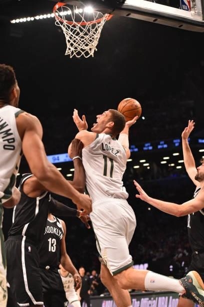 Brook Lopez of the Milwaukee Bucks shoots the ball against the Brooklyn Nets during Round 2, Game 7 on June 19, 2021 at Barclays Center in Brooklyn,...