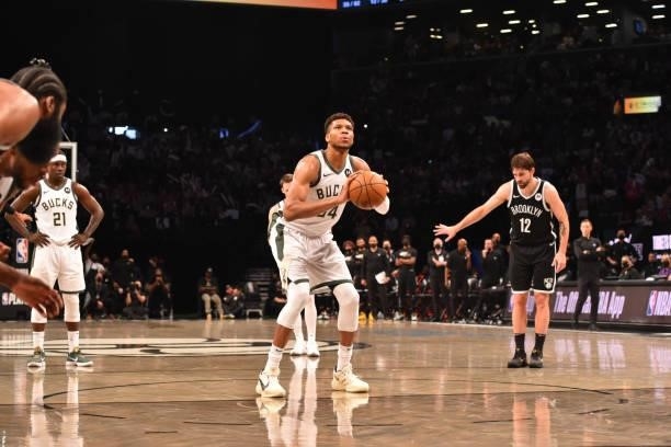 Giannis Antetokounmpo of the Milwaukee Bucks shoots a free throw during a game against the Brooklyn Nets during Round 2, Game 7 on June 19, 2021 at...