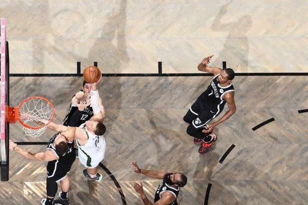 Brook Lopez of the Milwaukee Bucks drives to the basket during the game against the Brooklyn Nets during Round 2, Game 7 of the 2021 NBA Playoffs on...