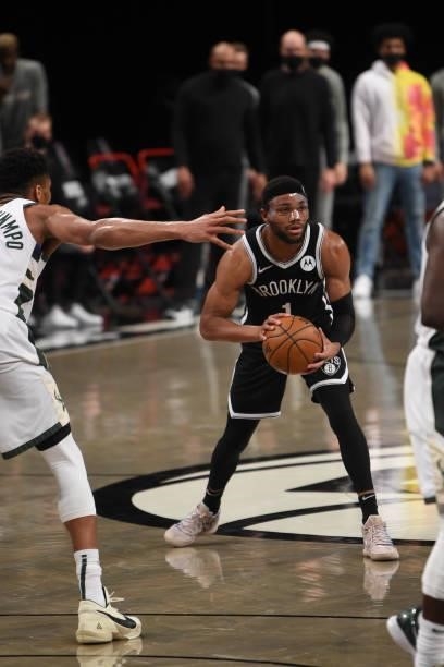Bruce Brown of the Brooklyn Nets handles the ball against the Milwaukee Bucks during Round 2, Game 7 on June 19, 2021 at Barclays Center in Brooklyn,...