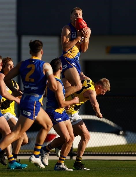 Nick Ebinger of the Seagulls marks against Garret McDonagh of the Tigers during the VFL Round 10 match between the Williamstown Seagulls and the...