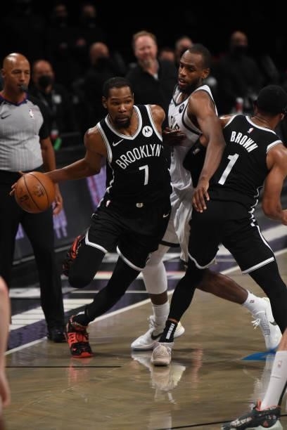 Kevin Durant of the Brooklyn Nets handles the ball against the Milwaukee Bucks during Round 2, Game 7 on June 19, 2021 at Barclays Center in...