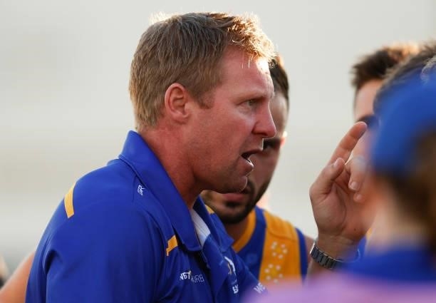 Coach Justin Plapp of the Seagulls addresses his players during the VFL Round 10 match between the Williamstown Seagulls and the Richmond Tigers at...
