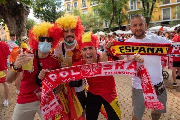 Spanish supporters cheer ahead of the UEFA Euro 2020 Championship Group E match between Spain and Poland at Estadio La Cartuja on June 19, 2021 in...