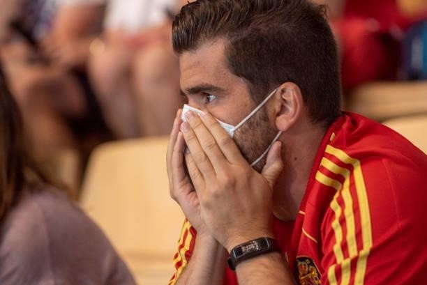 Spanish fans react during the UEFA Euro 2020 Championship Group E match between Spain and Poland at Estadio La Cartuja on June 19, 2021 in Seville,...