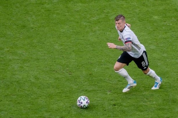 Toni Kroos of Germany controls the ball during the UEFA Euro 2020 Championship Group F match between Portugal and Germany at Football Arena Munich on...