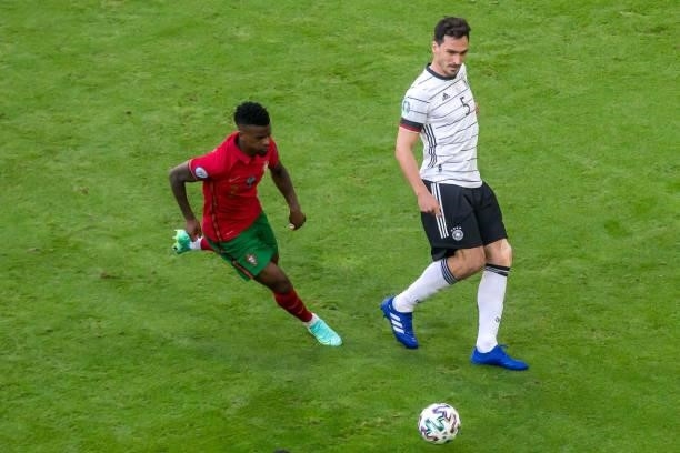 Nelson Semedo of Portugal and Mats Hummels of Germany battle for the ball during the UEFA Euro 2020 Championship Group F match between Portugal and...