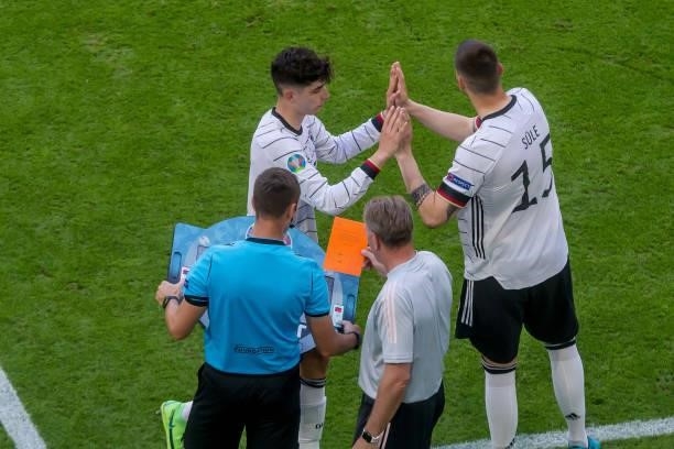 Kai Havertz of Germany and Niklas Suele of Germany substitutes during the UEFA Euro 2020 Championship Group F match between Portugal and Germany at...