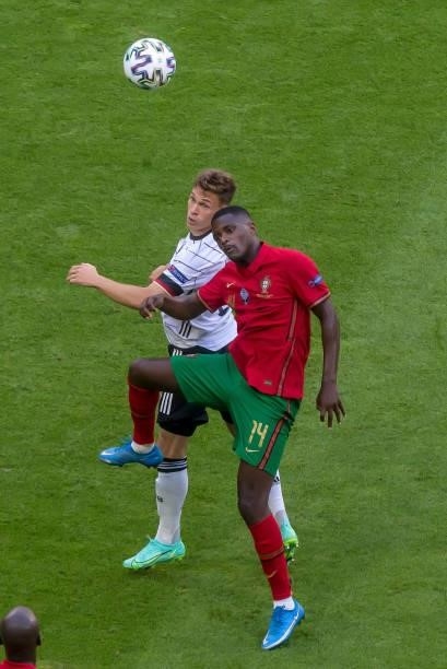 Joshua Kimmich of Germany and William Carvalho of Portugal battle for the ball during the UEFA Euro 2020 Championship Group F match between Portugal...