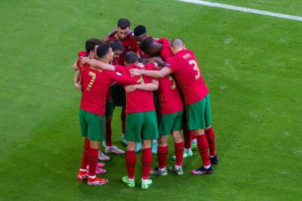 Cristiano Ronaldo of Portugal celebrates after scoring his team's first goal with teammates during the UEFA Euro 2020 Championship Group F match...