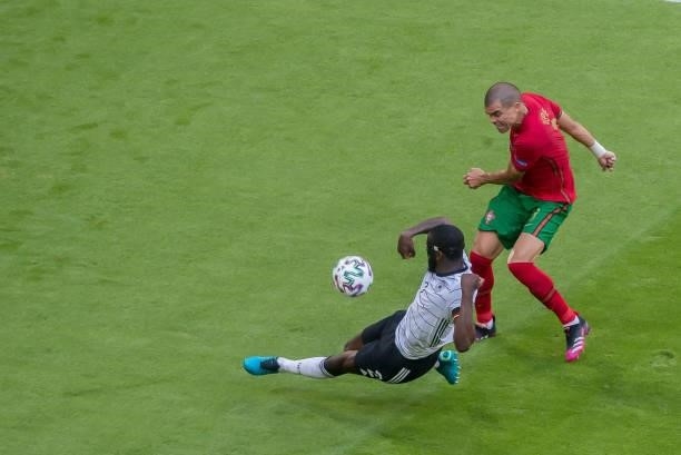 Antonio Ruediger of Germany and Pepe of Portugal battle for the ball during the UEFA Euro 2020 Championship Group F match between Portugal and...