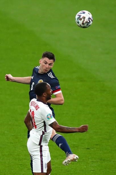Kieran Tierney of Scotland and Raheem Sterling of England during the UEFA Euro 2020 Championship Group D match between England and Scotland at...