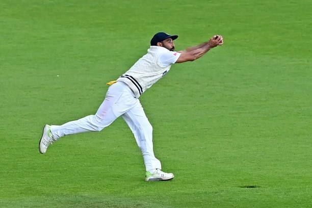 India's Mohammed Shami takes a catch to dismiss New Zealand's Devon Conway for 54 on the third day of the ICC World Test Championship Final between...