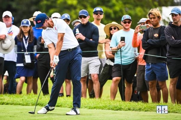 Adam Scott of Australia plays his shot from the 14th tee as fans watch during the third round of the 121st U.S. Open on the South Course at Torrey...