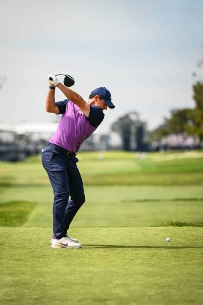 Rory McIlroy of Northern Ireland at the top of his swing as he plays his shot from the 18th tee during the third round of the 121st U.S. Open on the...