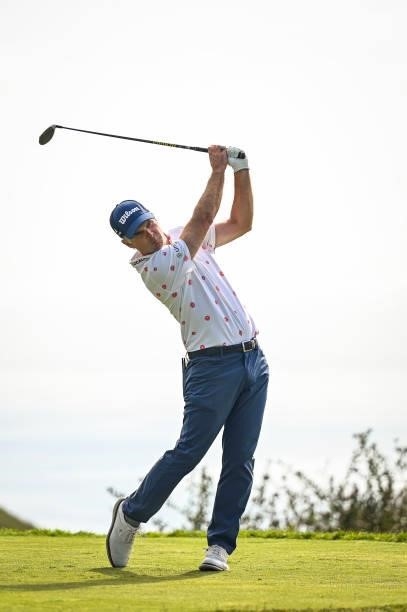 Kevin Streelman follows through as he plays his shot from the 17th tee during the third round of the 121st U.S. Open on the South Course at Torrey...
