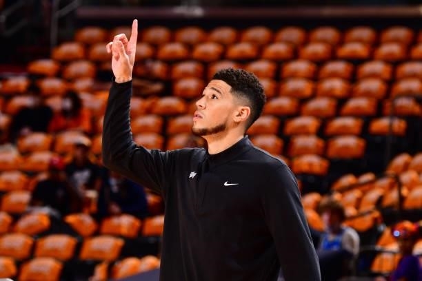 Devin Booker of the Phoenix Suns warms up before the game against the LA Clippers during Game 1 of the Western Conference Finals of the 2021 NBA...