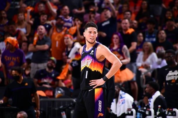 Devin Booker of the Phoenix Suns looks on during the game against the LA Clippers during Game 1 of the Western Conference Finals of the 2021 NBA...