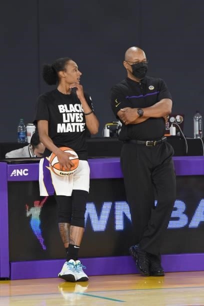 Assistant Coach Fred Williams and Brittney Sykes of the Los Angeles Sparks look on before the game against the New York Liberty on June 20, 2021 at...