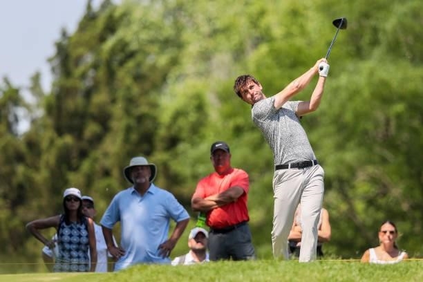 Ollie Schniederjans plays his shot from the 2nd tee during the final round of the Wichita Open Benefitting KU Wichita Pediatrics at Crestview Country...