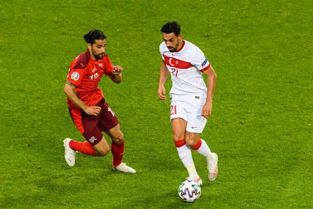 Irfan Can Kahveci of Turkey plays against Ricardo Rodríguez of Switzerland during the UEFA Euro 2020 Championship Group A match between Switzerland...