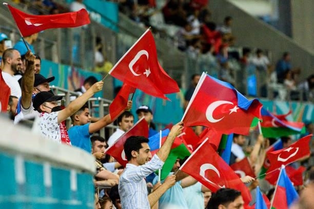 Turkeys supporters celebrating a score during the UEFA Euro 2020 Championship Group A match between Switzerland and Turkey on June 20, 2021 in Baku,...