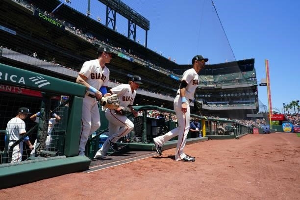 The San Francisco Giants take the field before the game between the Philadelphia Phillies and the San Francisco Giants at Oracle Park on Sunday, June...
