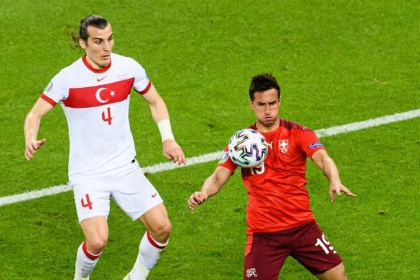 Mario Gavranovic of Switzerland plays against Caglar Soyuncu of Turkey during the UEFA Euro 2020 Championship Group A match between Switzerland and...