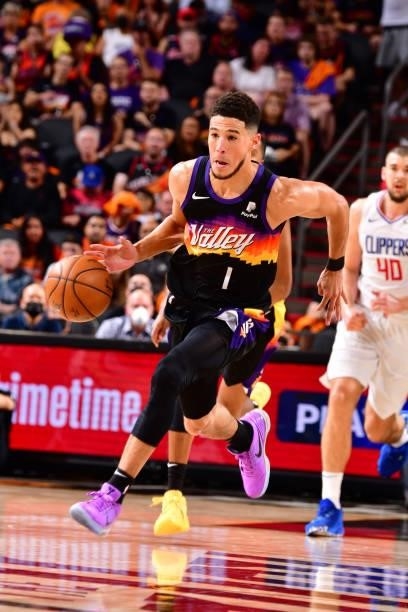 Devin Booker of the Phoenix Suns dribbles the ball during the game against the LA Clippers during Game 1 of the Western Conference Finals of the 2021...