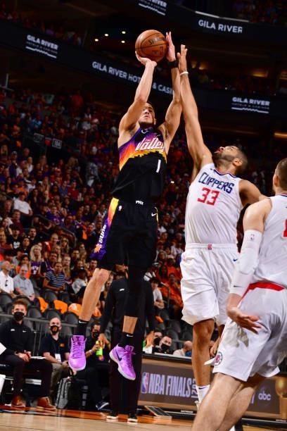 Devin Booker of the Phoenix Suns shoots the ball during the game against the LA Clippers during Game 1 of the Western Conference Finals of the 2021...