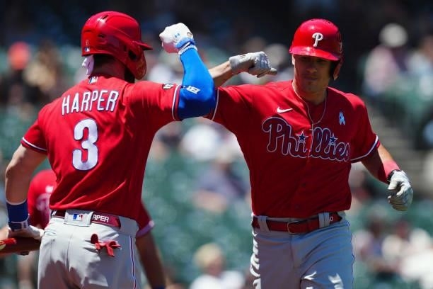 Realmuto of the Philadelphia Phillies celebrates with Bryce Harper after hitting a home run during the game between the Philadelphia Phillies and the...